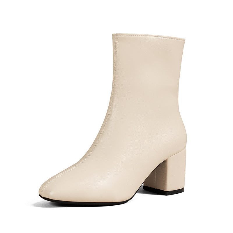 Stiefel mit spitzem Zehenbereich und klobigem Absatz